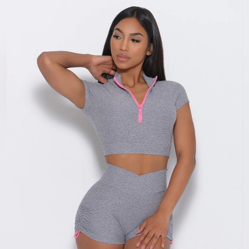 Bombshell Sportswear Gray Crop Top with Pink Zip Detail